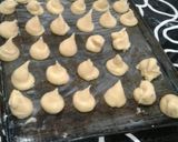 Foto del paso 4 de la receta: Bombas de crema con hilos de caramelo