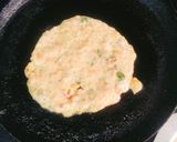 A picture of step 3 of Leftover Poha Chilla with fresh Veggies.