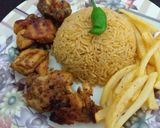 A picture of step 6 of Smokey Chicken(BBQ in pan😍)with fried rice and fries.