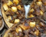 A picture of step 11 of Stuffed Veggie-Mushroom-Tofu Baked Aubergine Boats.