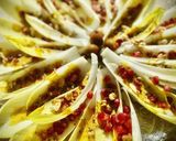 Foto del paso 3 de la receta: Barquitas de endivia con granada y cremoso de frutos secos a la cúrcuma y curry