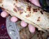 A picture of step 3 of Nuggets paratha roll.