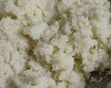 A picture of step 3 of Coconut ladoo.