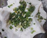 A picture of step 1 of Rice flour roti with green garlic.