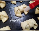 A picture of step 24 of Bow tie buns.