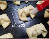 A picture of step 24 of Bow tie buns.
