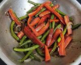 A picture of step 2 of Vegetable Sizzler in sizzler plate.