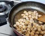 A picture of step 2 of Makhana revdl sesame seeds coated (til).