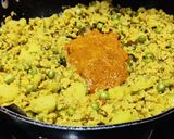 A picture of step 4 of Soya granules with potato and fresh green peas.