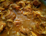 A picture of step 8 of Ragi mudda with mutton curry.