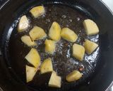 A picture of step 1 of Egg potato curry.