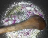 A picture of step 2 of Fried njahi (black beans).