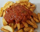 A picture of step 2 of My Homemade Chips with Salsa and grated Cheese. 😘.