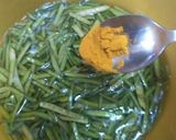 A picture of step 1 of Rajasthani dry gawarphali sabji.