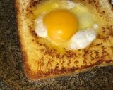 A picture of step 4 of Egg in toasted bread.