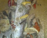 Foto del paso 4 de la receta: Merluza al papillote con pimientos del piquillo y champiñones naturales