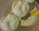 A picture of step 5 of Vickys Snowman Cookie Pops.