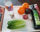 A picture of step 1 of Orange avocado salad.