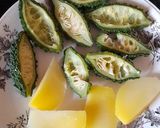 A picture of step 2 of Bitter Gourd Green Mango Curry.
