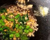 A picture of step 2 of Mix Veg Upma.
