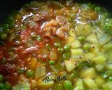 A picture of step 4 of Sweet potato bottlegourd peas and capsicum sabji.