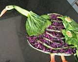 A picture of step 16 of Peacock style salad.
