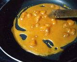 A picture of step 4 of Murmura til laddu.
