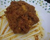 A picture of step 5 of Gobhi mussalam.