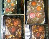 A picture of step 1 of Baked and roasted beef steaks some roast potatoes and tomatos.