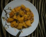 A picture of step 5 of Matoke (cooked bananas and potatoes).