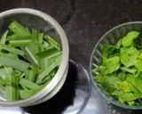 A picture of step 2 of Mint leaves and lemon grass juice.