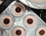 A picture of step 7 of Gulab Jamun Cupcakes with thandai frosting.