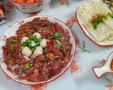 Hình bước làm 5 của món Lẩu đầu cá hồi nấu măng chua
