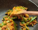 A picture of step 11 of Besani bhindi fry.