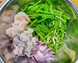 A picture of step 1 of Pajeon (spring onion pancakes).