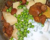 A picture of step 9 of Potato & Pea Biryani.