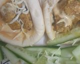 A picture of step 4 of Chicken pita wrap.