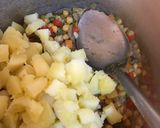 A picture of step 6 of Chickpeas with potatoe.