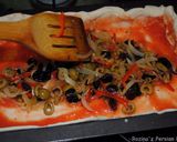 A picture of step 7 of Puff pastry pizza with Raisins & bell pepper.