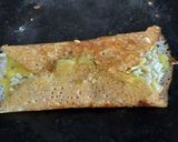 A picture of step 3 of Schezwan masala dosa.