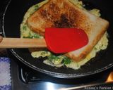 A picture of step 8 of Toasted bread omelette with herbs / cheese.
