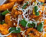 A picture of step 3 of Masala potato garnish with onion flower stalk.
