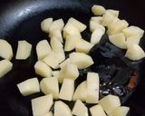 A picture of step 5 of Desi Spiced Chickpeas and Potatoes.
