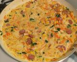 A picture of step 2 of Corndog Pie.