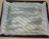 A picture of step 4 of Kiwi swiss roll cake.