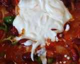 A picture of step 4 of Mexican chicken enchiladas.