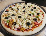 A picture of step 2 of Chicken Tikka Pizza 🍕🍕.