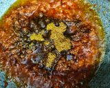 A picture of step 4 of Shahi Chhole Bhature prepared with garam masala.
