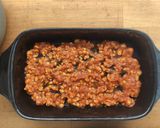 Foto del passaggio 4 della ricetta Cannelloni al ragù di soia con ricotta vegetale e spinaci