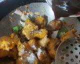 A picture of step 2 of Garlic Chicken with white sauce.